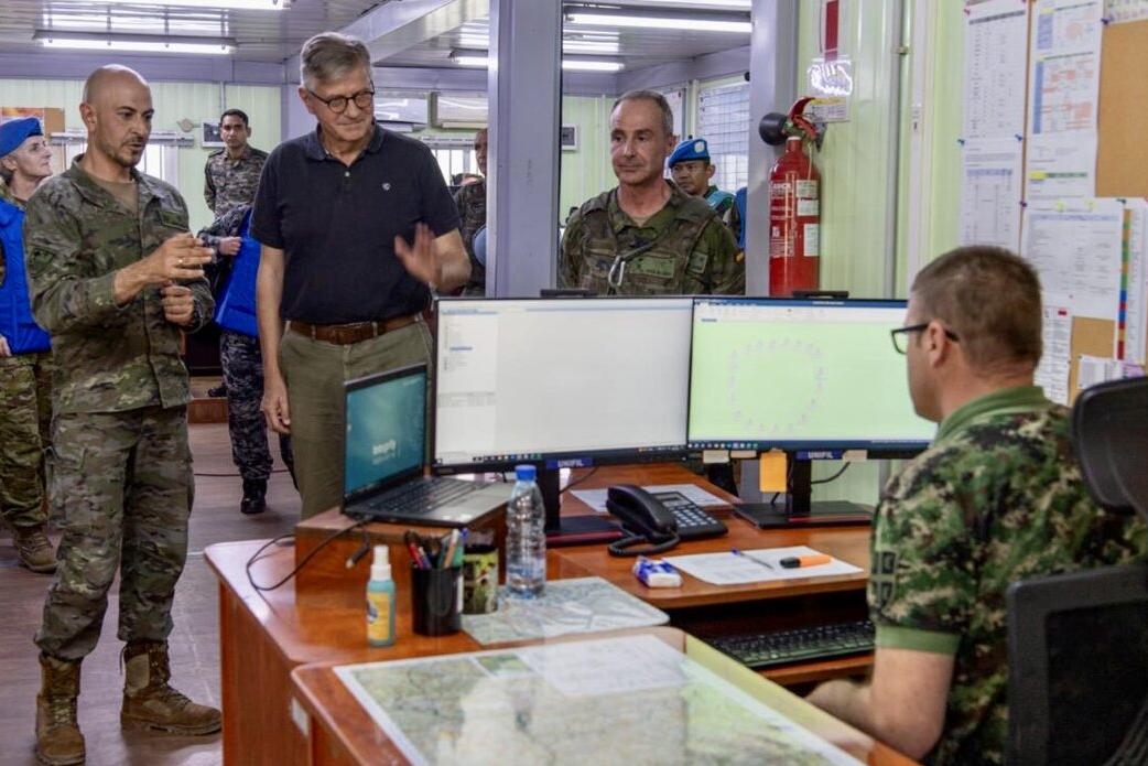 Jean-Pierre Lacroix converses with peacekeepers.